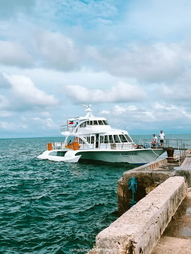 Ferry boat on blue waters heading to Siquijor